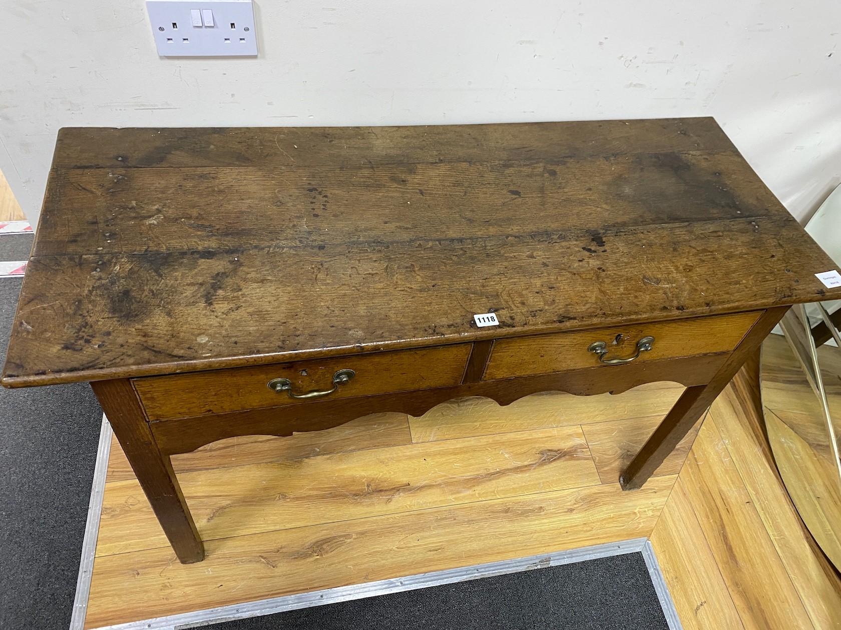 A late 18th century oak two drawer side table, width 120cm, depth 48cm, height 72cm